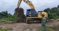Sasaran Fisik TMMD Ke-129 Kodim 0313/KPR, Di Kebut Gunakan Alat Berat Untuk Peningkatan Badan Jalan