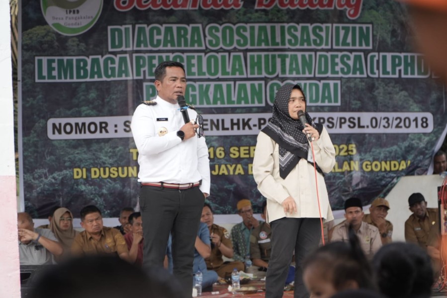 Bupati Pelalawan Hadiri Sosialisasi Keberadaan Izin Lembaga Pengelola Hutan Desa (LPHD) di Desa Pangkalan Gondai